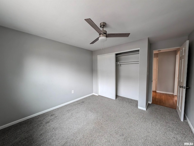 unfurnished bedroom featuring carpet flooring, ceiling fan, and a closet