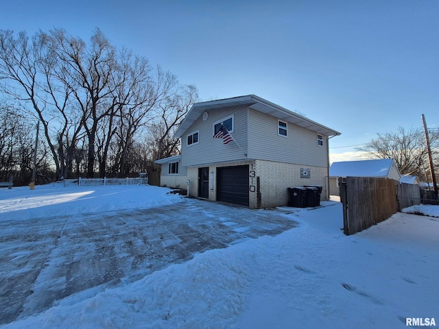 exterior space with a garage