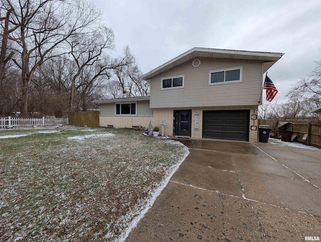 tri-level home featuring a garage