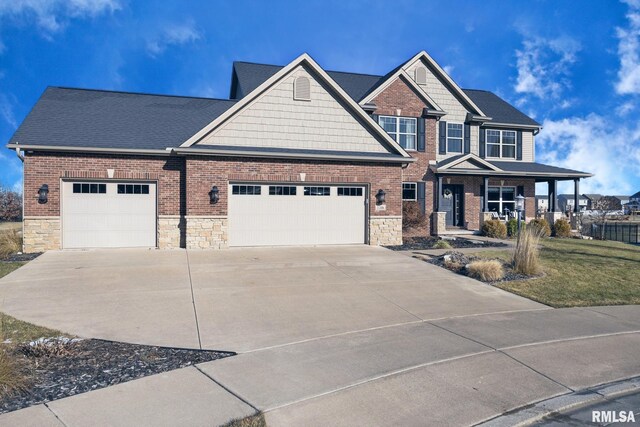 craftsman house featuring a porch and a garage