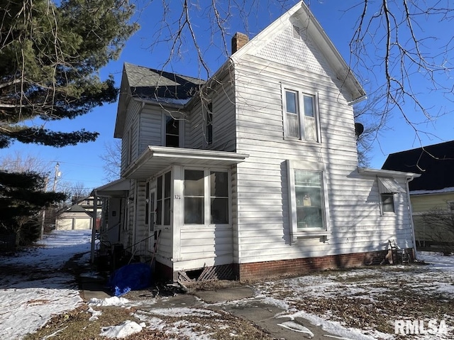 view of snow covered property