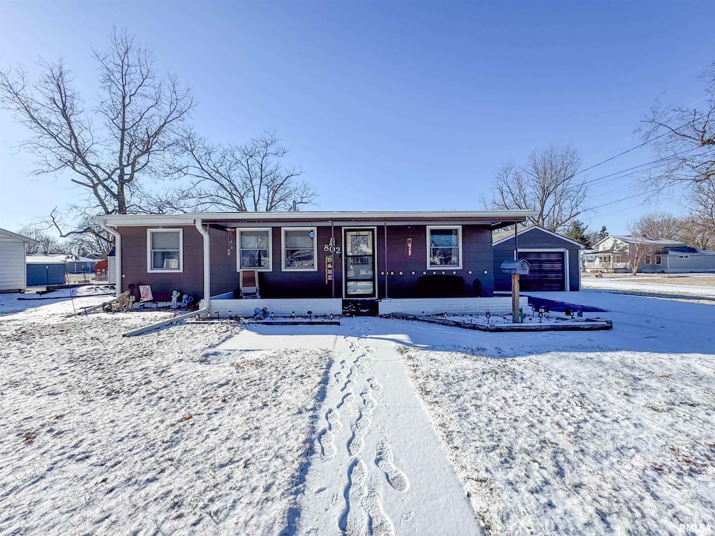 ranch-style home with a garage