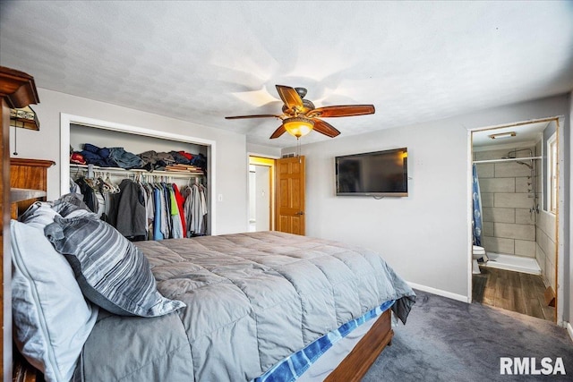 bedroom with a closet, dark colored carpet, ceiling fan, a textured ceiling, and ensuite bathroom