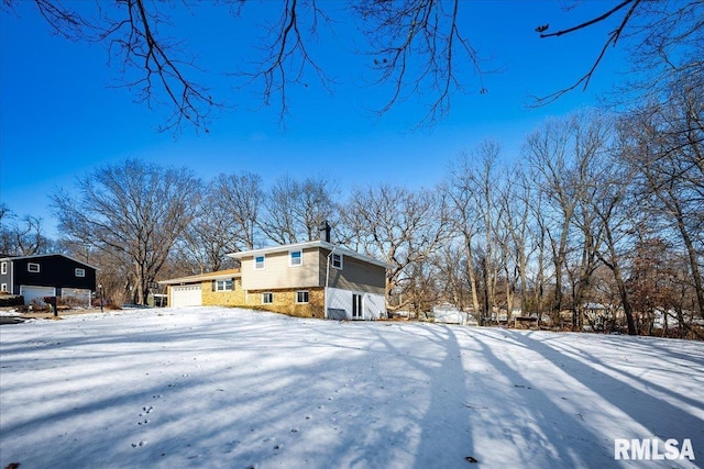 exterior space featuring a garage