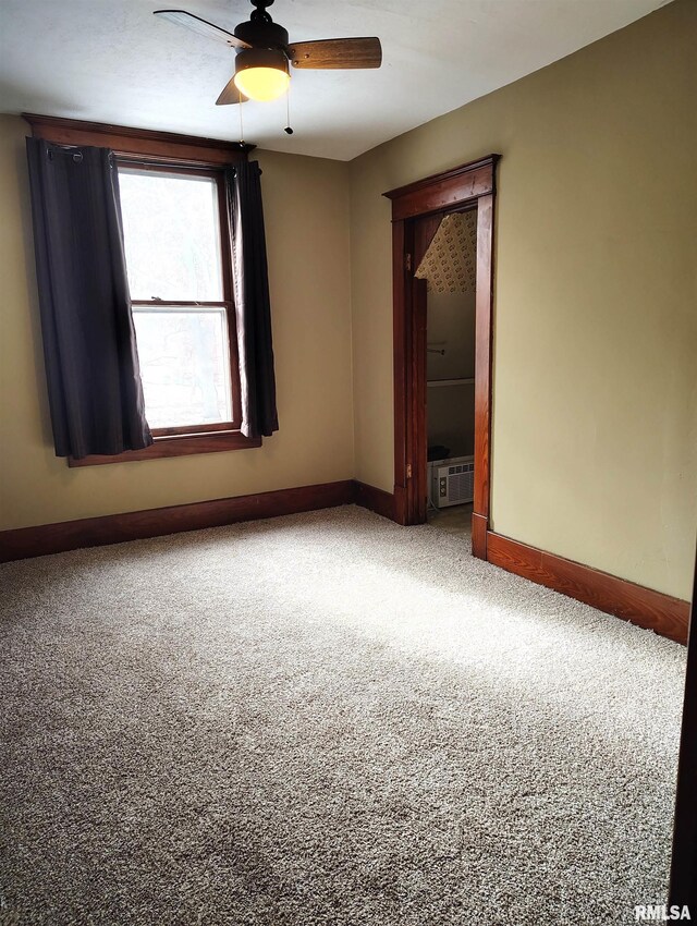 unfurnished sunroom with beam ceiling and wooden ceiling