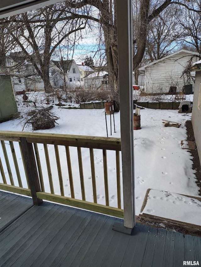 view of snow covered deck