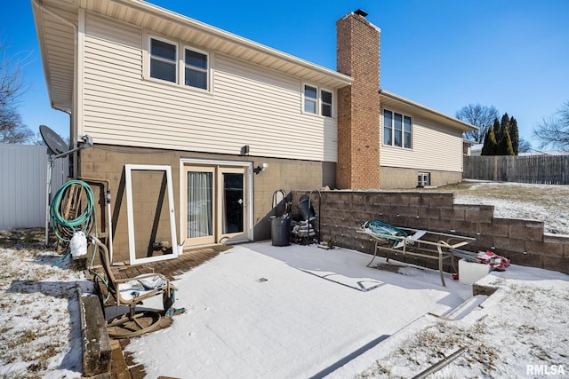 view of snow covered property