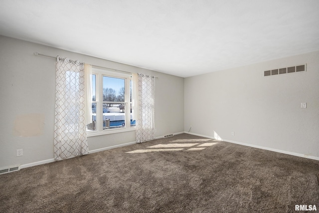 spare room featuring carpet floors