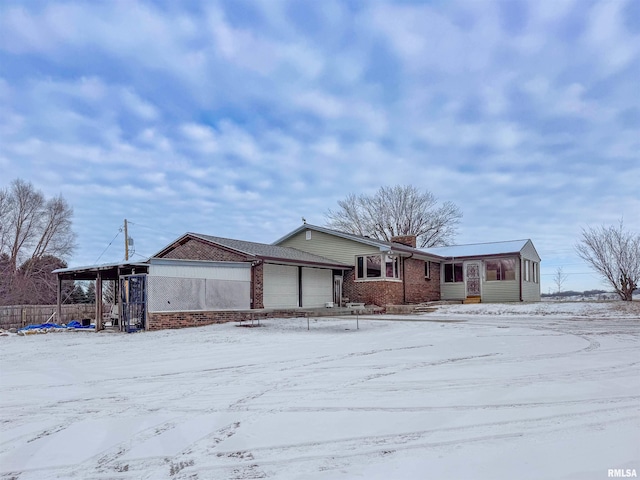 single story home featuring a garage