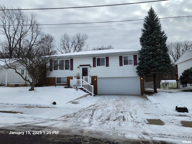 split foyer home featuring a garage