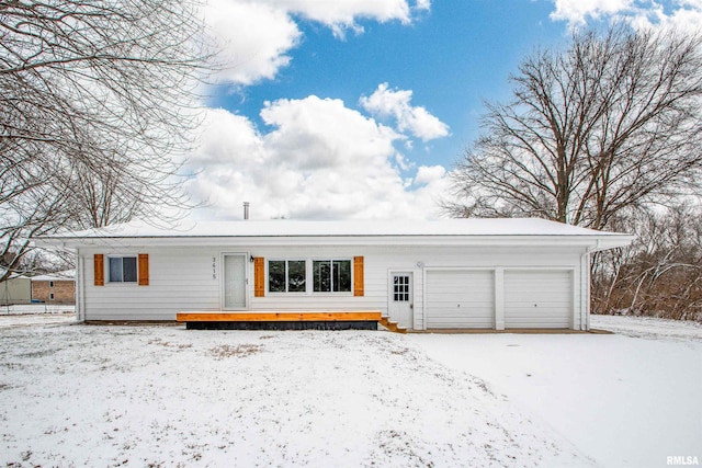 ranch-style home with a garage