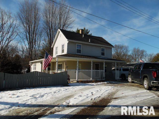 country-style home with covered porch