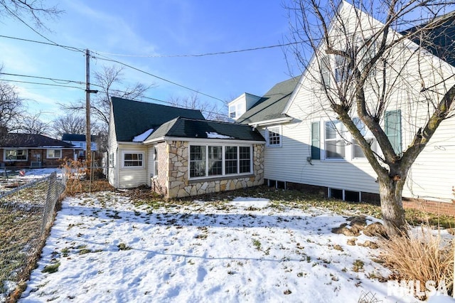 view of snow covered property