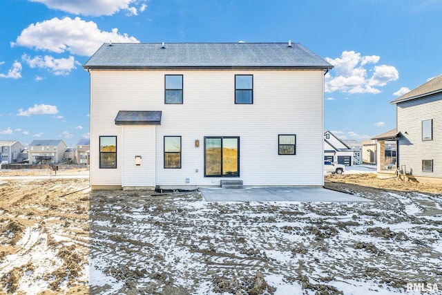 view of snow covered property