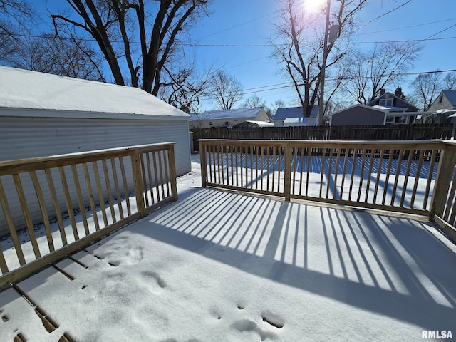 view of snow covered deck