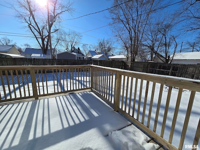 view of snow covered deck