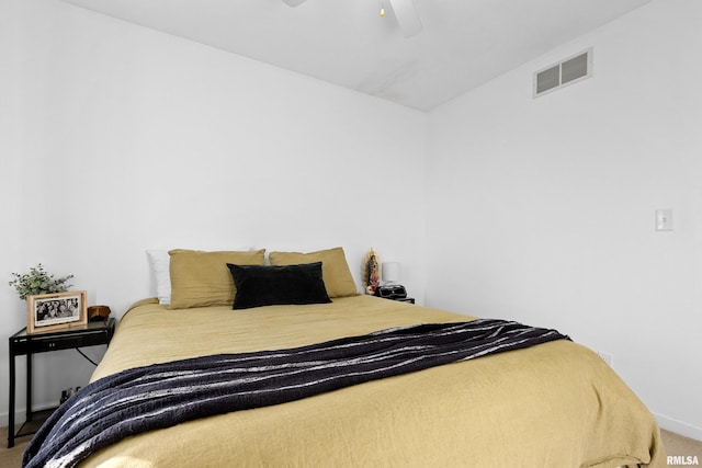 bedroom featuring ceiling fan and carpet