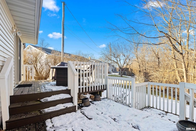 view of snow covered deck