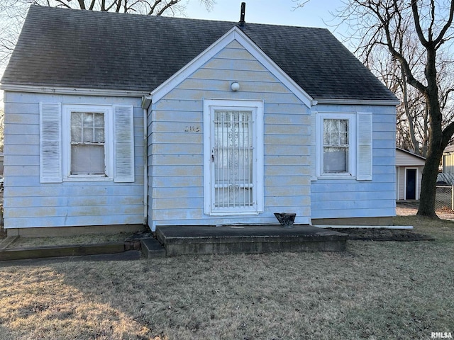 exterior space with a front yard