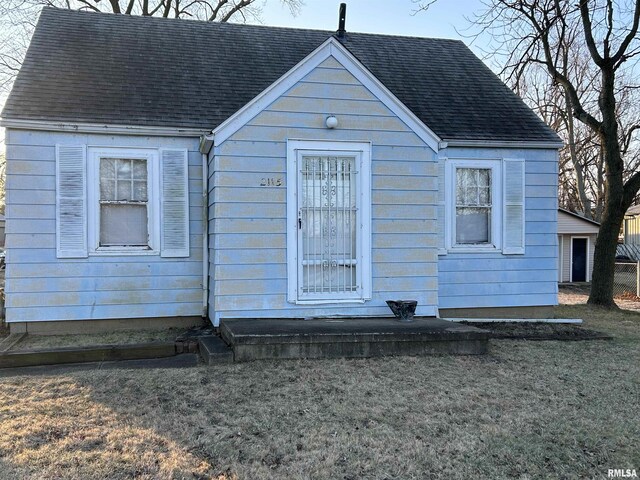 exterior space featuring a front lawn