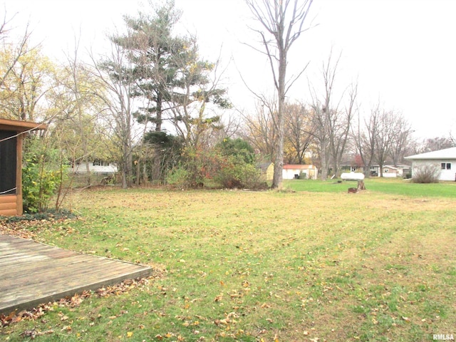 view of yard with a deck