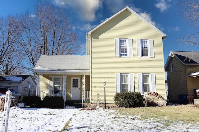 view of front property featuring covered porch