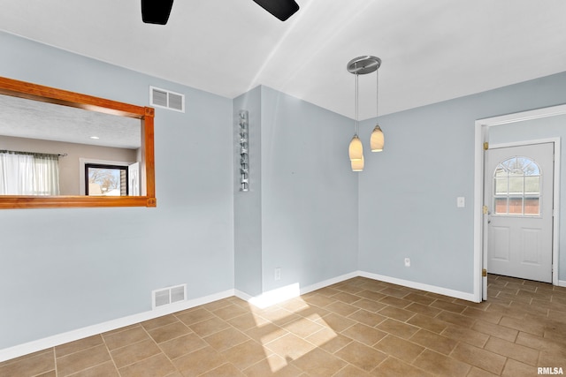 unfurnished room with ceiling fan