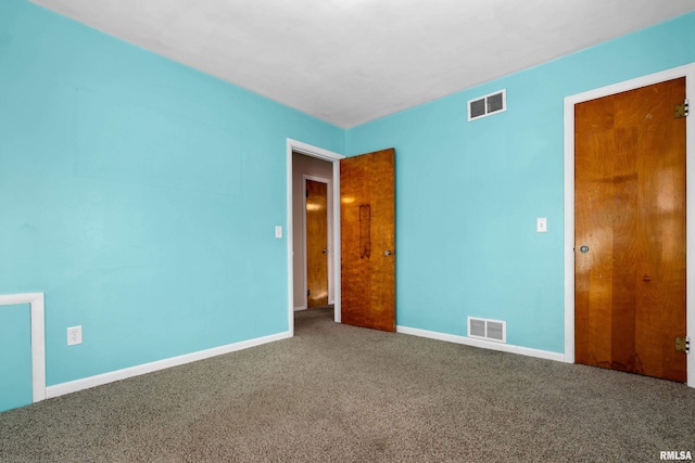 empty room featuring carpet