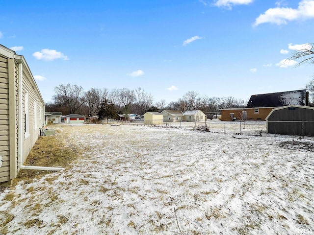 view of yard covered in snow