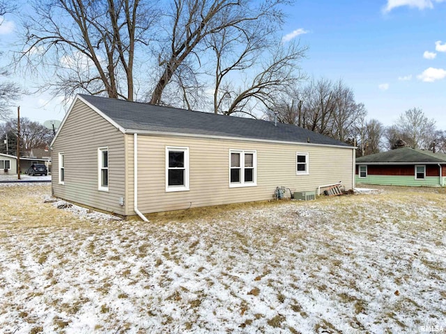 view of snow covered house