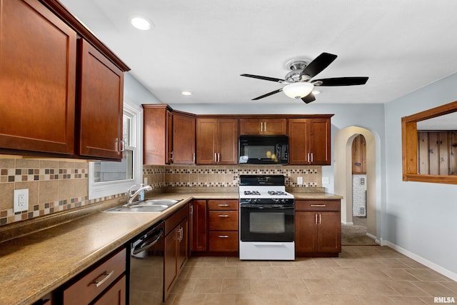 kitchen with sink, backsplash, ceiling fan, and black appliances