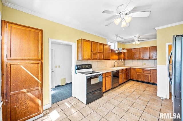 kitchen featuring backsplash, black appliances, sink, crown molding, and light tile patterned flooring