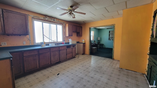 kitchen with ceiling fan and sink