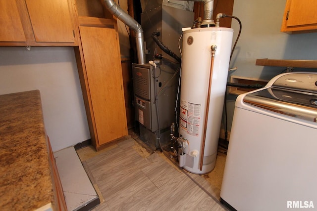 utilities with washer / clothes dryer and water heater