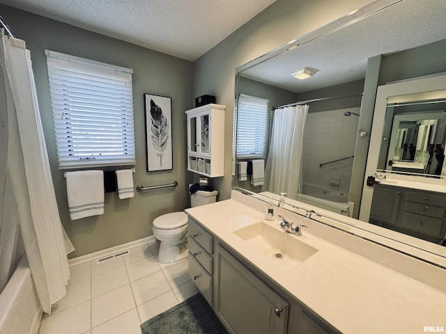 full bathroom with a textured ceiling, vanity, shower / tub combo, and tile patterned flooring