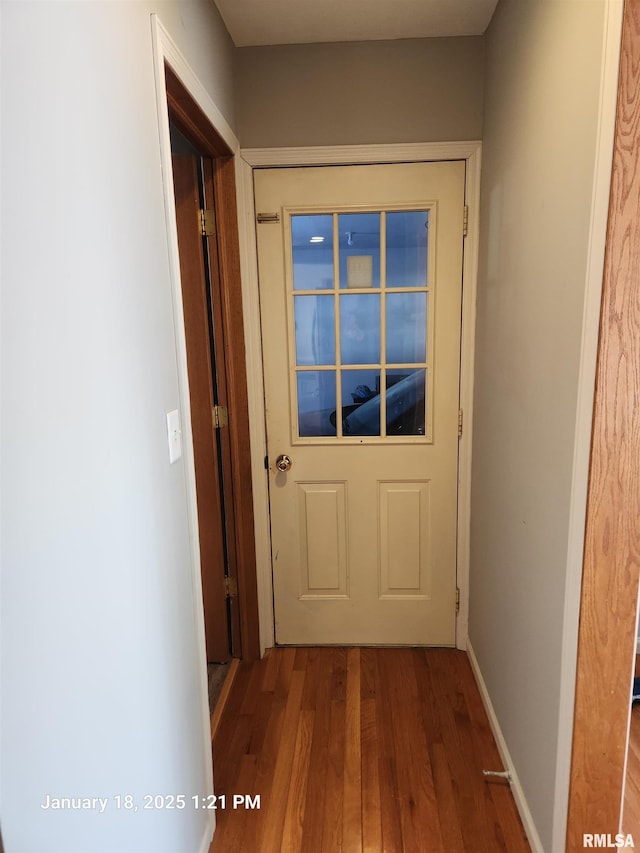 doorway to outside featuring hardwood / wood-style floors