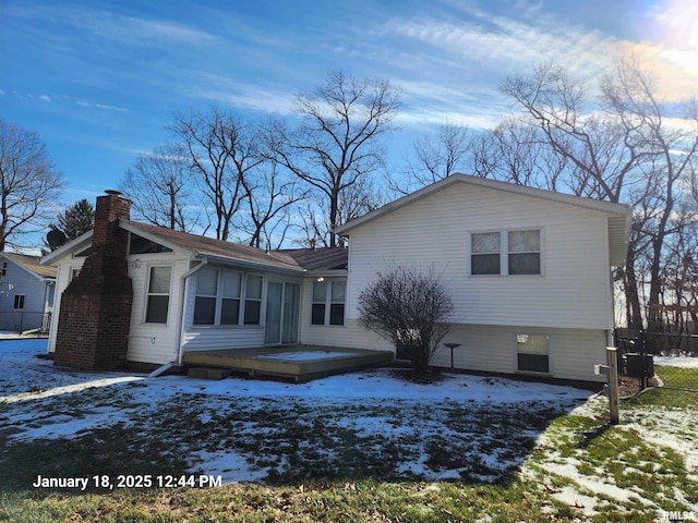 view of snow covered property