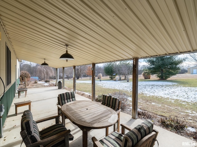 view of snow covered patio