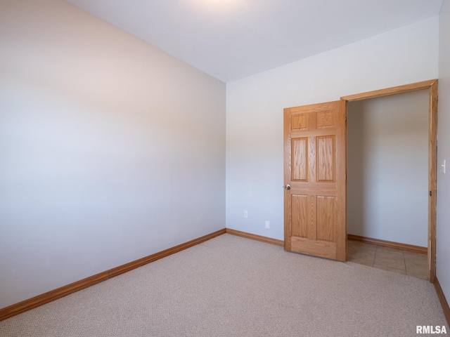 unfurnished bedroom featuring carpet