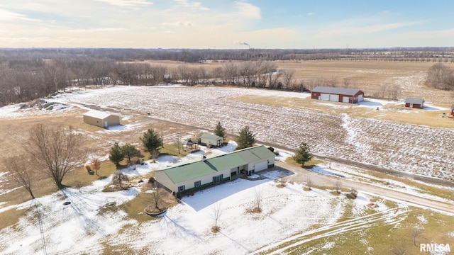 snowy aerial view featuring a rural view