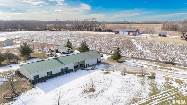 snowy aerial view with a rural view