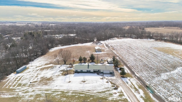 snowy aerial view with a rural view