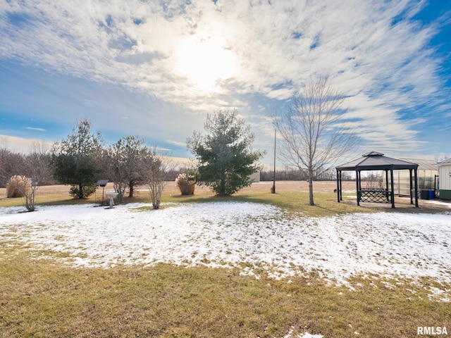 surrounding community with a gazebo and a yard