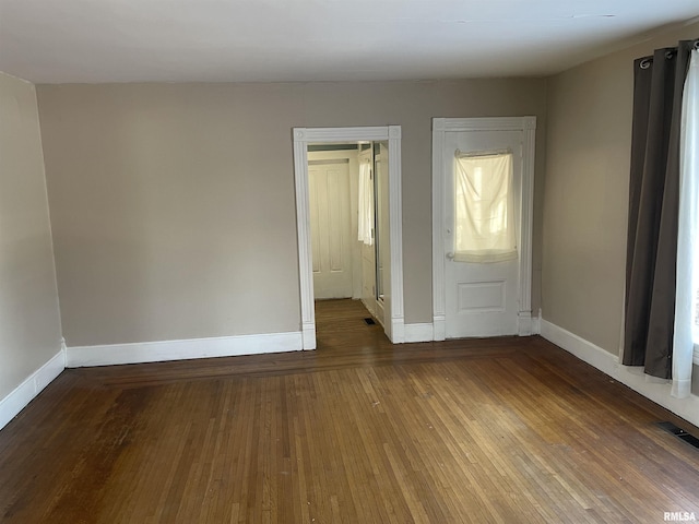 foyer entrance featuring dark hardwood / wood-style flooring