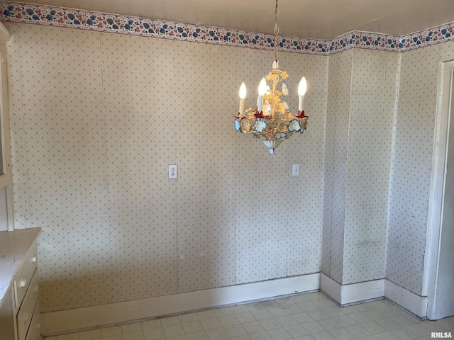 unfurnished dining area with light tile patterned floors and a chandelier