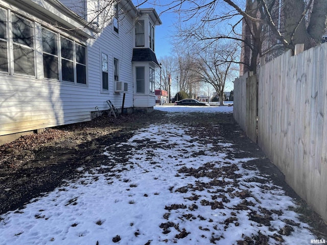 view of yard covered in snow