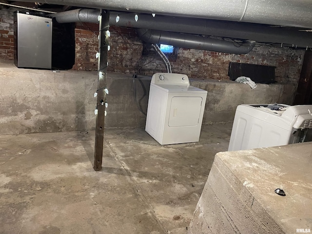 basement with independent washer and dryer