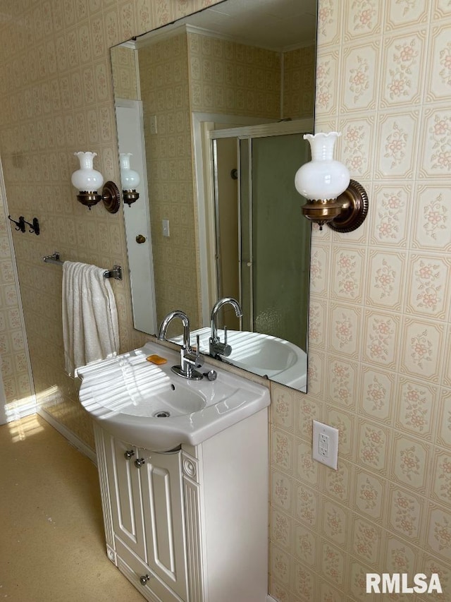 bathroom with vanity and walk in shower