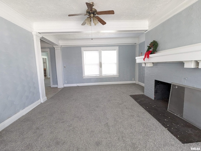 unfurnished living room with ceiling fan, a textured ceiling, dark colored carpet, and a fireplace