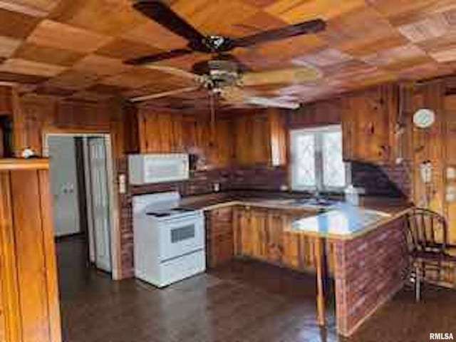 kitchen with wood ceiling, white appliances, kitchen peninsula, and ceiling fan